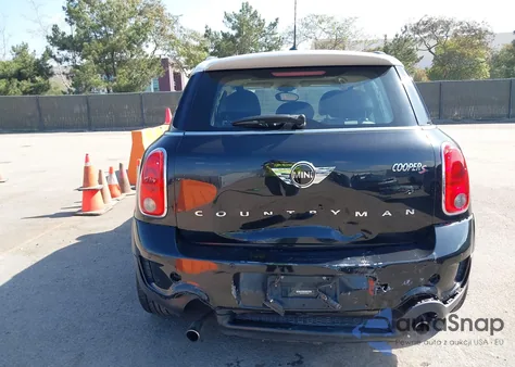 2015 Mini Countryman Cooper S z USA, uszkodzony, nr VIN WMWZC3C5XFWT04804